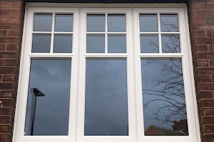 triple panelled window with square panels