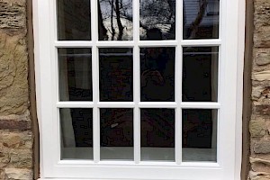 Small panelled window installation